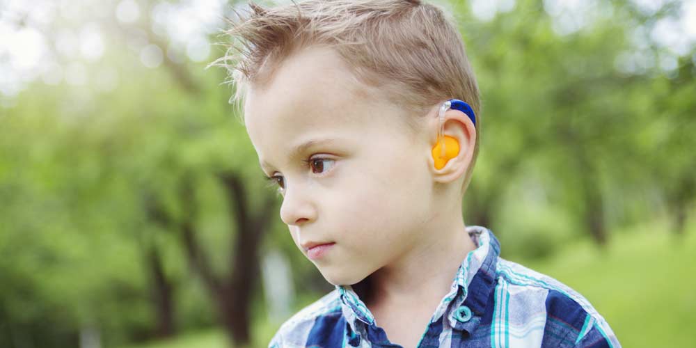 boy with hearing aid