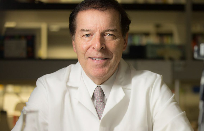 Headshot of Garth Powis, D. Phil., professor and director of the Sanford Burnham Prebys Medical Discovery Institute (SBP) NCI-designated Cancer Center. 