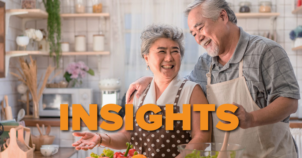 insights diet graphic: happy older couple cooking together in kitchen