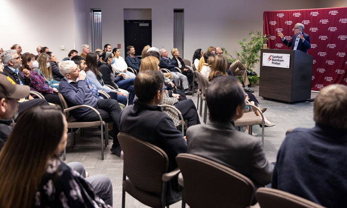 Erkki Ruoslahti gives lecture to full a full auditorium 