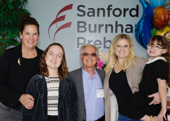 Professor José Luis Millán (center) with the Fischer family (left) and the Britt family (right)