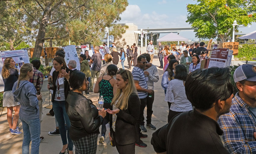 People at 2023 Trainee Symposium poster session