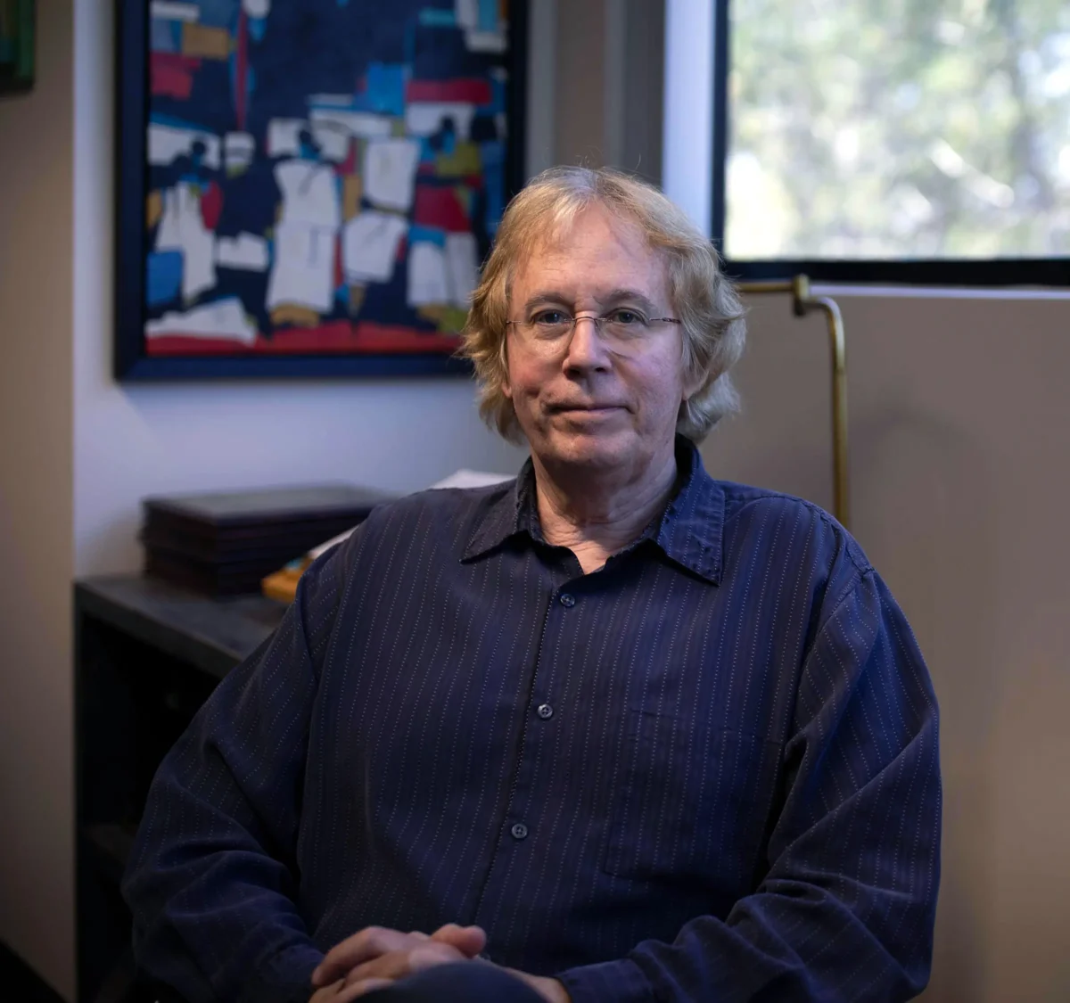 Jamey Marth, PhD, siting in his office