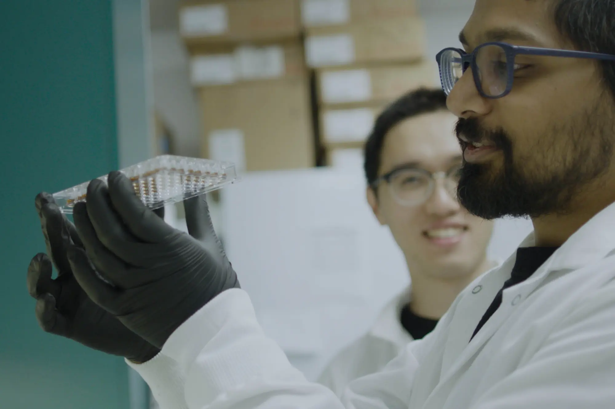 Scientists working together in a lab