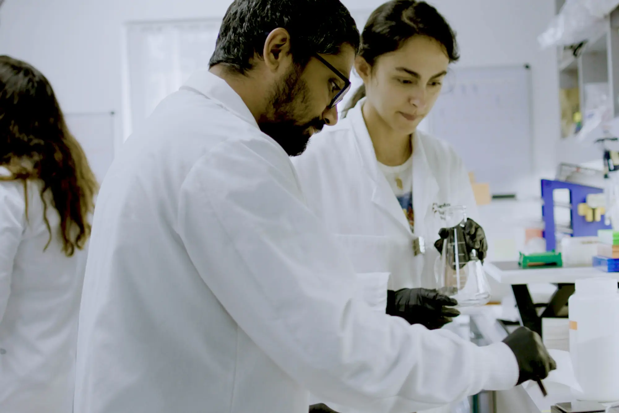 Scientists collaborate in a lab