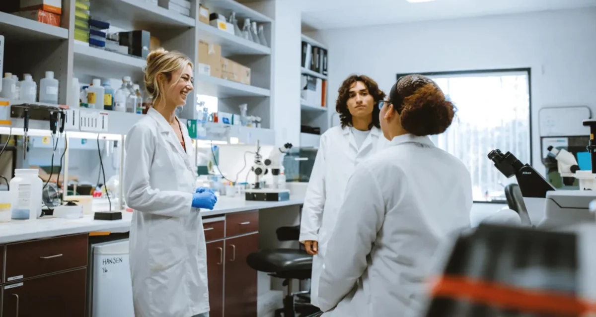 scientists conversing in lab