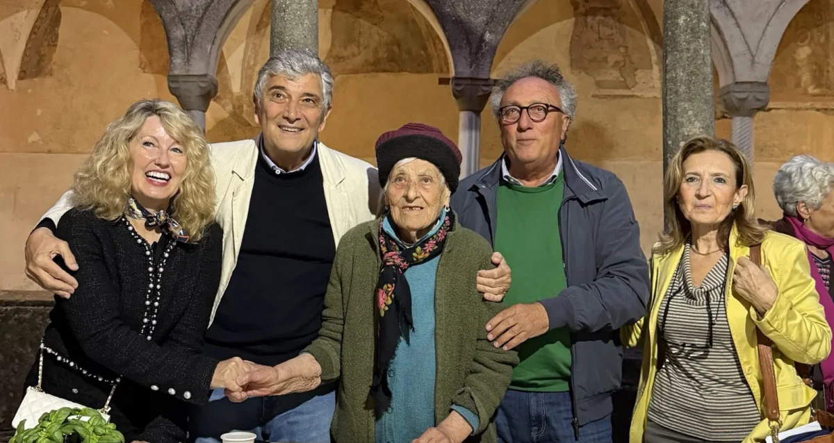 CIAO study scientists gather with an elderly resident of Cilento, Italy