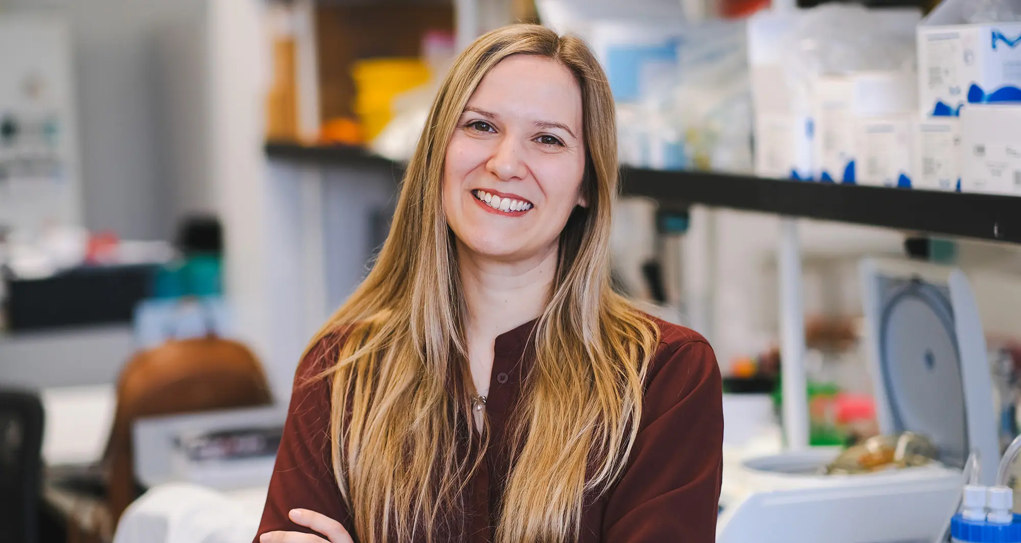 Sara Ancel profile photo in the lab - image credit: Sanford Burnham Prebys
