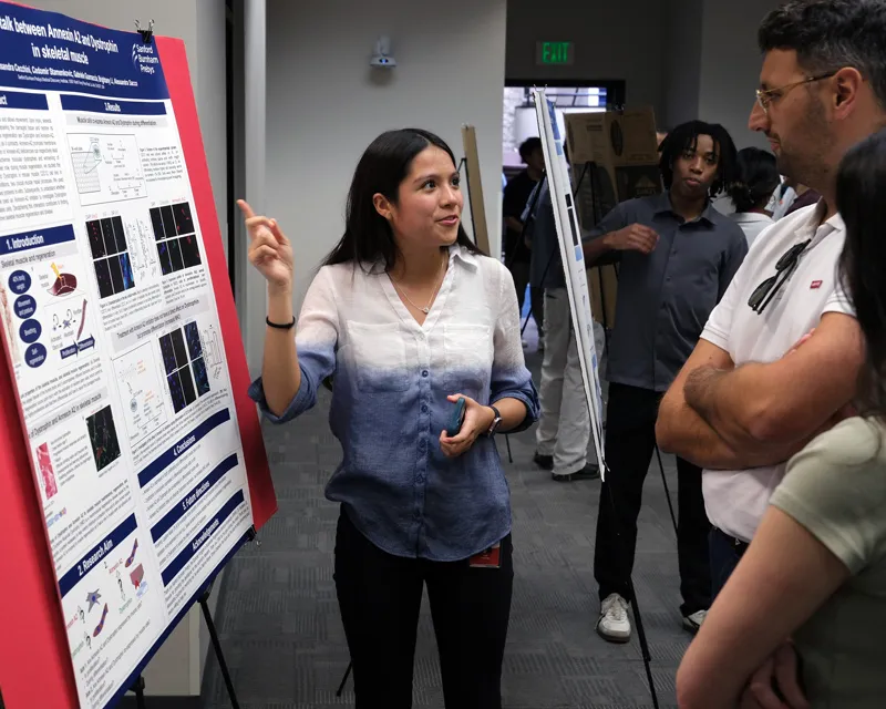 SPARK intern presenting poster. Image credit: Sanford Burnham Prebys