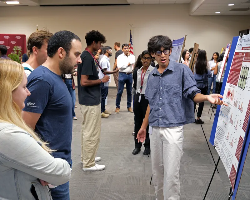 SPARK intern presenting poster. Image credit: Sanford Burnham Prebys