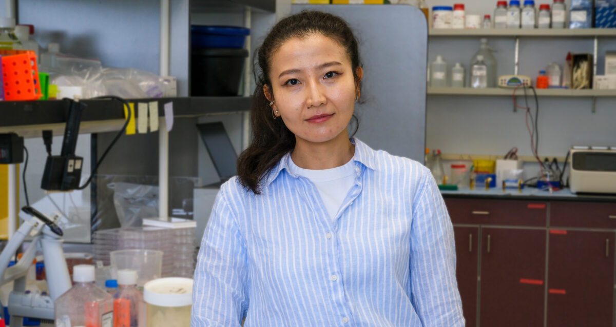 Arailym Sarsembayeva, PhD, profile photo in lab. Photo credit Sanford Burnham Prebys