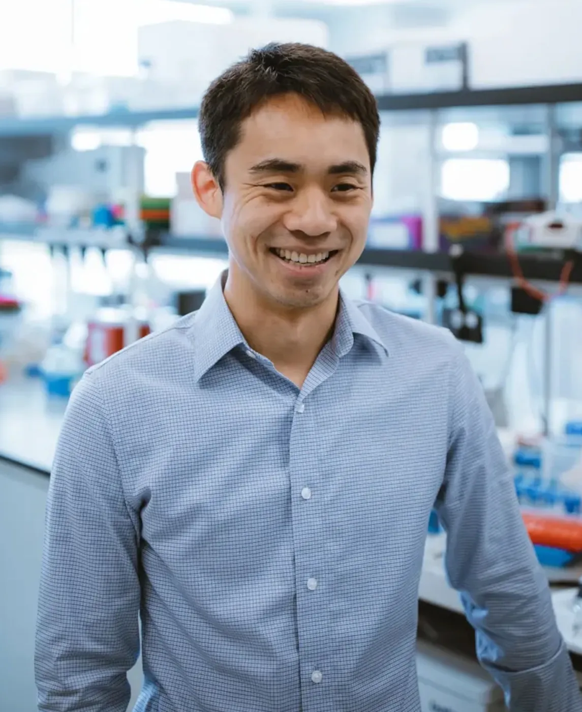 Eric Wang, PhD, profile photo in lab. Image credit: Sanford Burnham Prebys