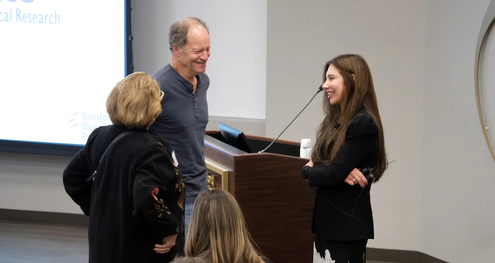 David Brenner, MD, meets with speaker Susan Tousi, MBA