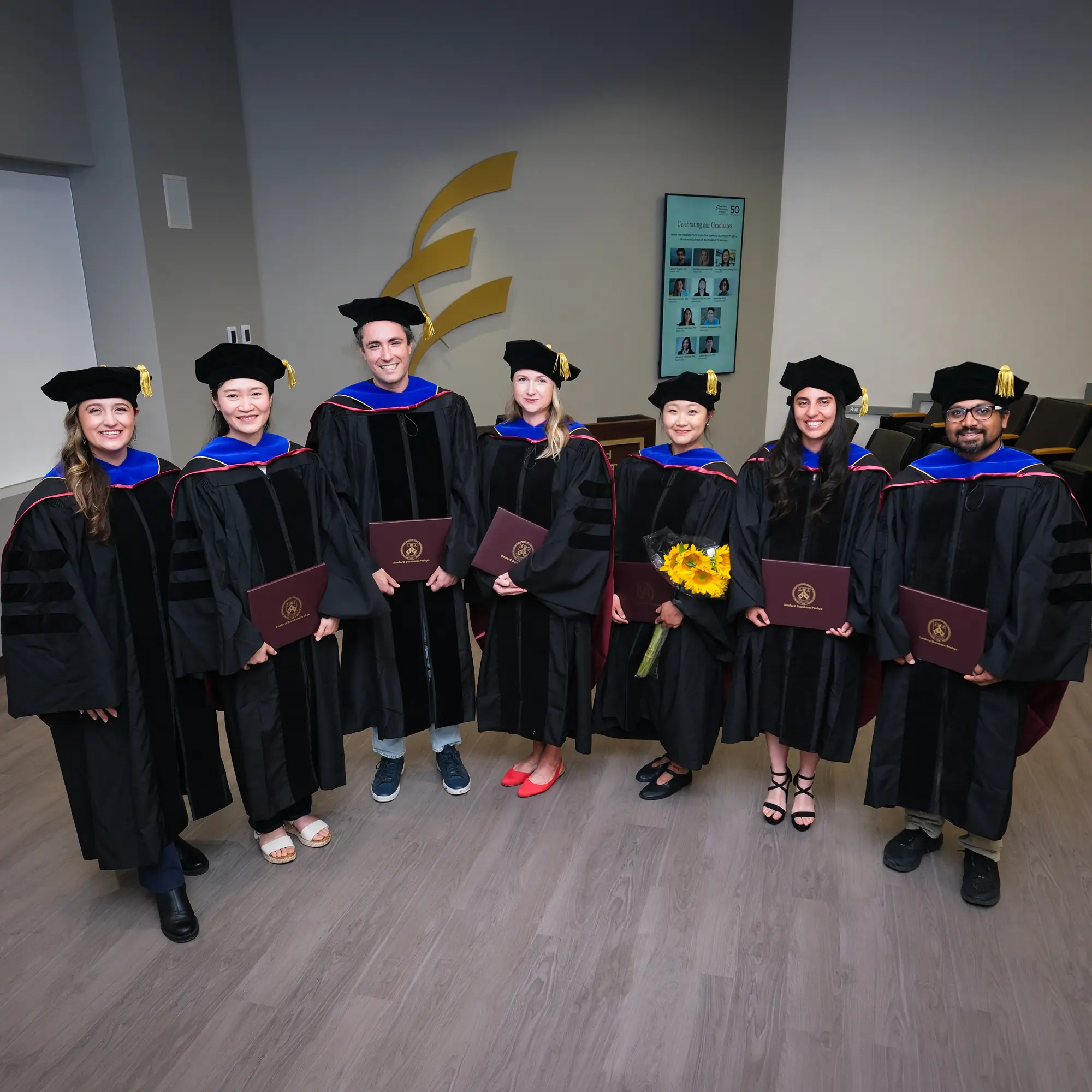 The graduates recognized at the third annual Commencement ceremony, from left to right: Michaela Romero, Yu-Ling (Linda) Chang, Cedomir Stamenkovic, Sviatlana Zaretski, Jiaqian (Emily) Wu, Ximena Diaz-Olea and Adarsh Rajesh